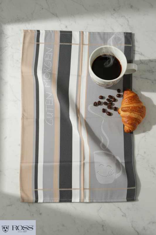 Guten Morgen Geschirrtuch mit Kaffee und Croissant auf Marmor